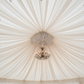 Tent ceiling with radial draping and chandelier drape tube