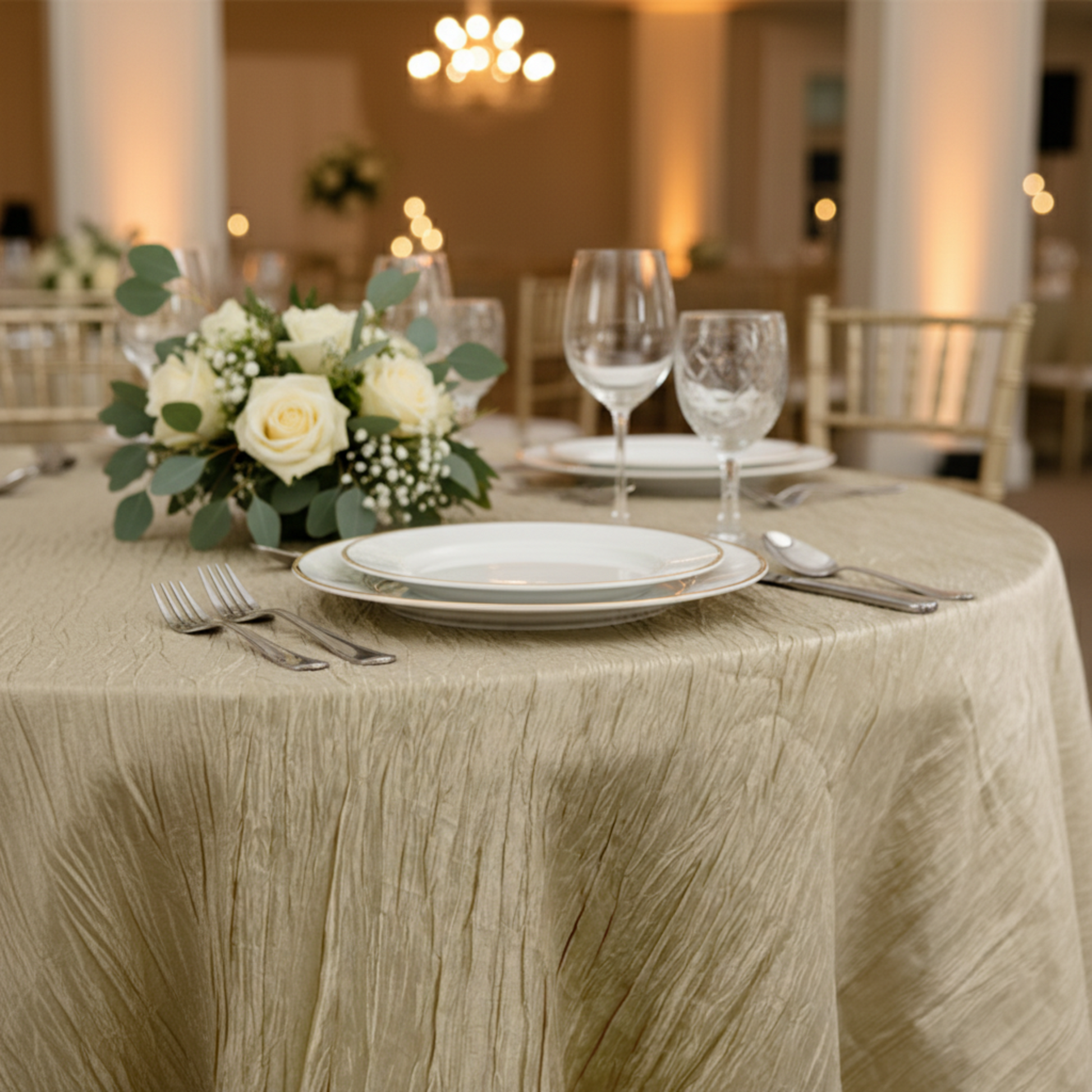 Close-up of 132 Accordion Crinkle Champagne Round Tablecloth