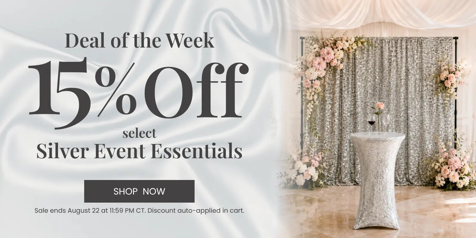 Deal of the Week: 15% off select Silver Event Essentials; silver sequin backdrop with pink florals and a tall table.