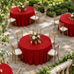 Elevated diagonal view of red tablecloth at an event