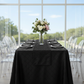 pintuck-90x156-rectangular-tablecloth-lifestyle-black