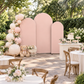 Garden baby shower with blush trio arches