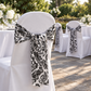Garden reception with damask chair sash