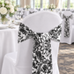 Indoor reception with damask chair sash