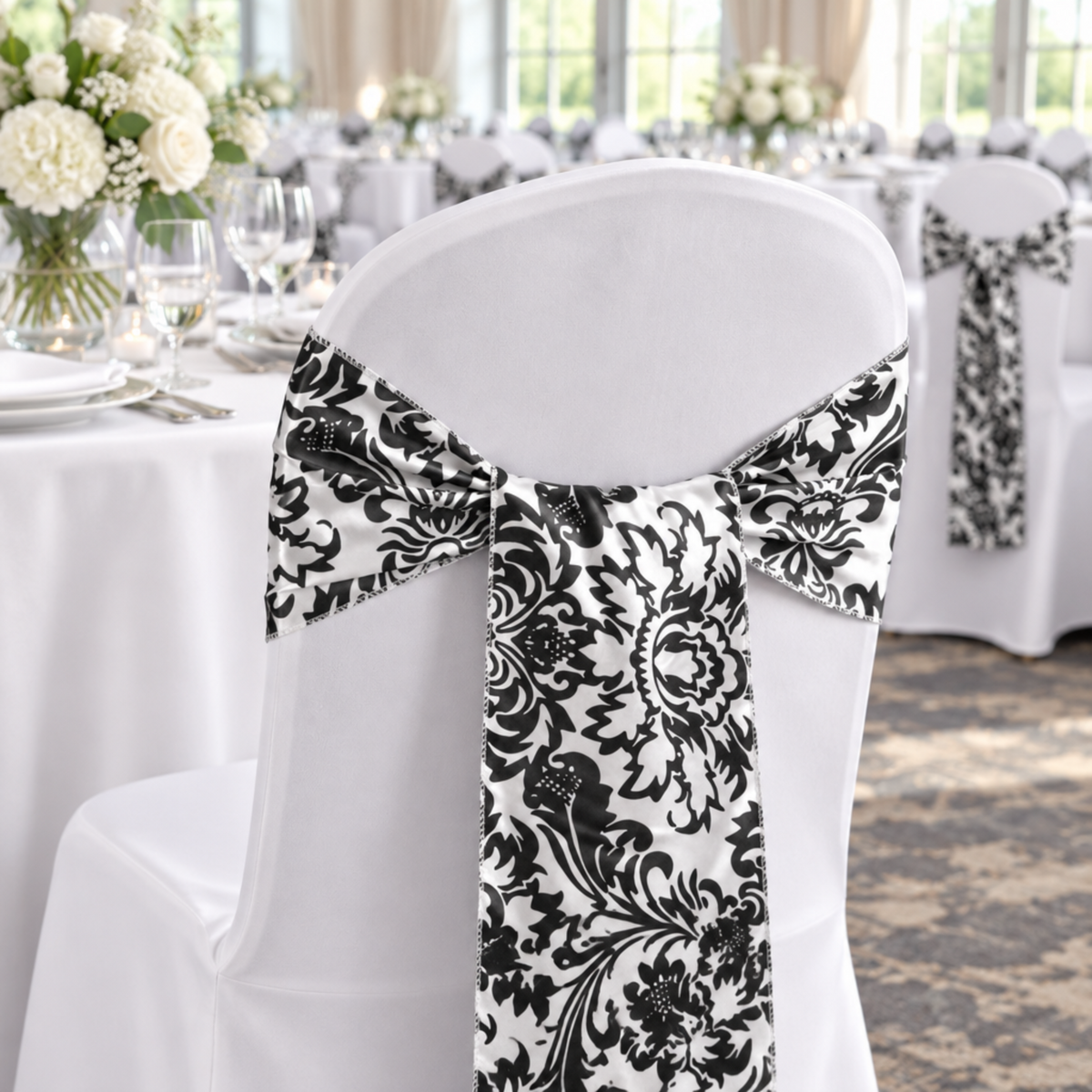 Indoor reception with damask chair sash