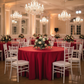 Indoor Wedding Reception with Apple Red 120 Round Satin Tablecloth