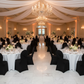 Indoor Wedding Reception with Black Cross Back Stretch Spandex Chair Cover