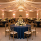 Indoor Wedding Reception with 132 Round Navy Blue Tablecloth