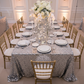 Large Payette Sequin Tablecloth 90"x132" Rectangular - Silver with Chiavari Gold Chairs.