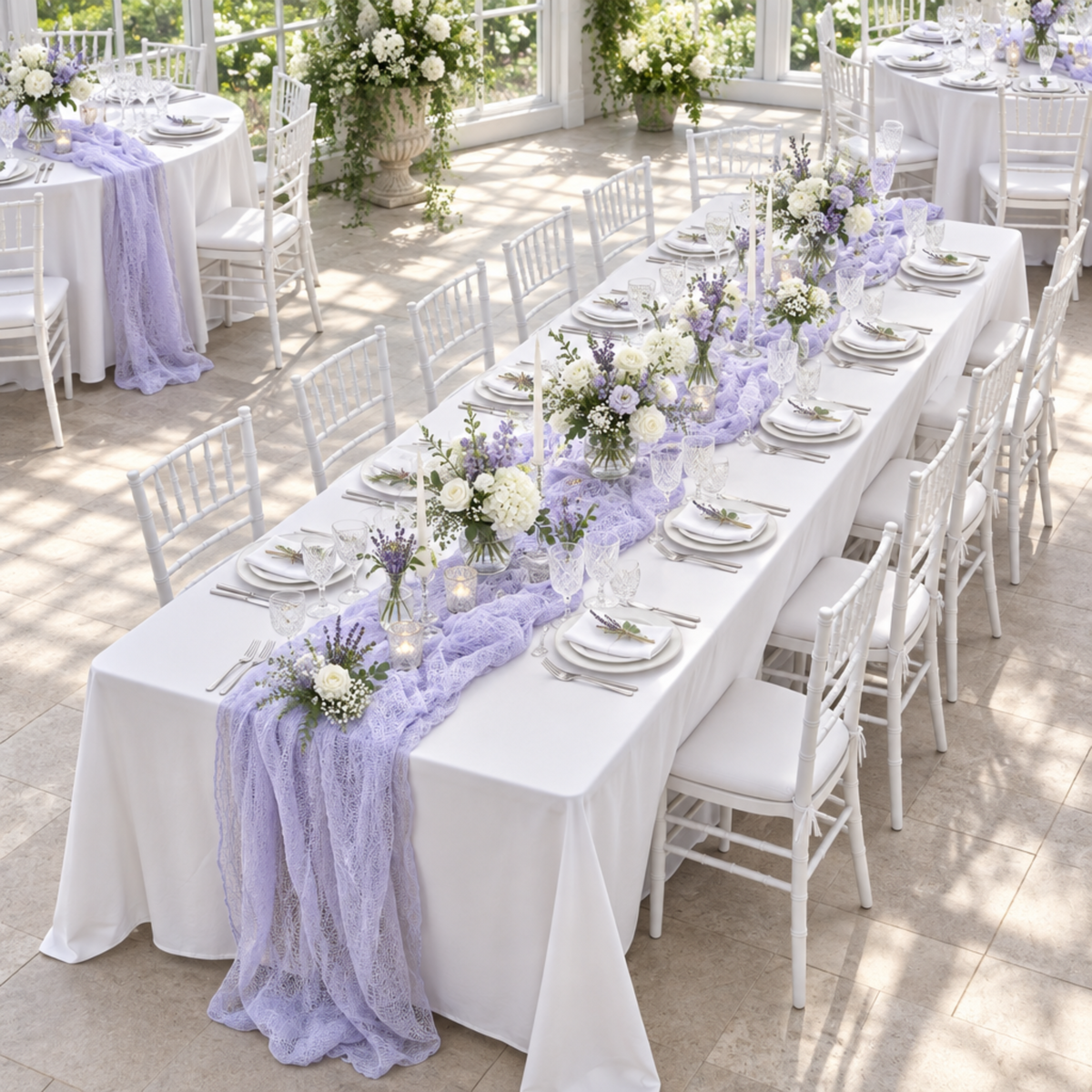 Lavender cheesecloth runner at a bright conservatory bridal shower