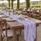 Lavender cheesecloth runner at a rustic vineyard wedding