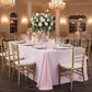 90"x132" Rectangular Oblong Premium Polyester Tablecloth - Pastel Pink with Chiavari Gold Chairs.
