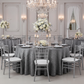 Accordion Crinkle Taffeta 132" Round Tablecloth - Silver with Chiavari Silver Chairs.