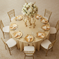 Lamour Satin 120" Round Tablecloth - Gold Antique with Chiavari Gold Chairs.