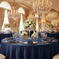 Lamour Satin 120" Round Tablecloth - Navy Blue in Luxurious Reception.