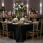 Lamour Satin 90"x156" Rectangular Oblong Tablecloth - Black with Chiavari Gold Chairs.