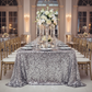 Large Payette Sequin Tablecloth 90"x132" Rectangular - Silver with Chiavari Gold Chairs.