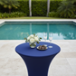 Spandex Cocktail Table Cover 36" Round - Navy Blue in Outdoor Pool Reception.