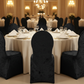 Velvet Stretch Spandex Banquet Chair Cover - Black in a Luxurious Dining Reception.