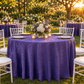 Outdoor garden reception scene with purple crinkle shimmer tablecloth