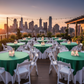Outdoor rooftop terrace with emerald green satin overlays