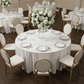 Pintuck 132" Round Tablecloth - White with White Oval Chairs.