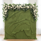 Pleated Crinkle Olive Green Fabric backdrop with florals on top