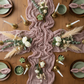 Premium Cheesecloth Table Runner 16FT x 25" - Dusty Rose/Mauve in Flat Lay View.