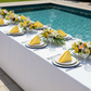 Premium Polyester Napkin 20"x20" - Canary Yellow in Poolside Reception.