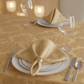 Satin Napkin 20"x20" - Gold Antique in Indoor Reception with Plate Setting.