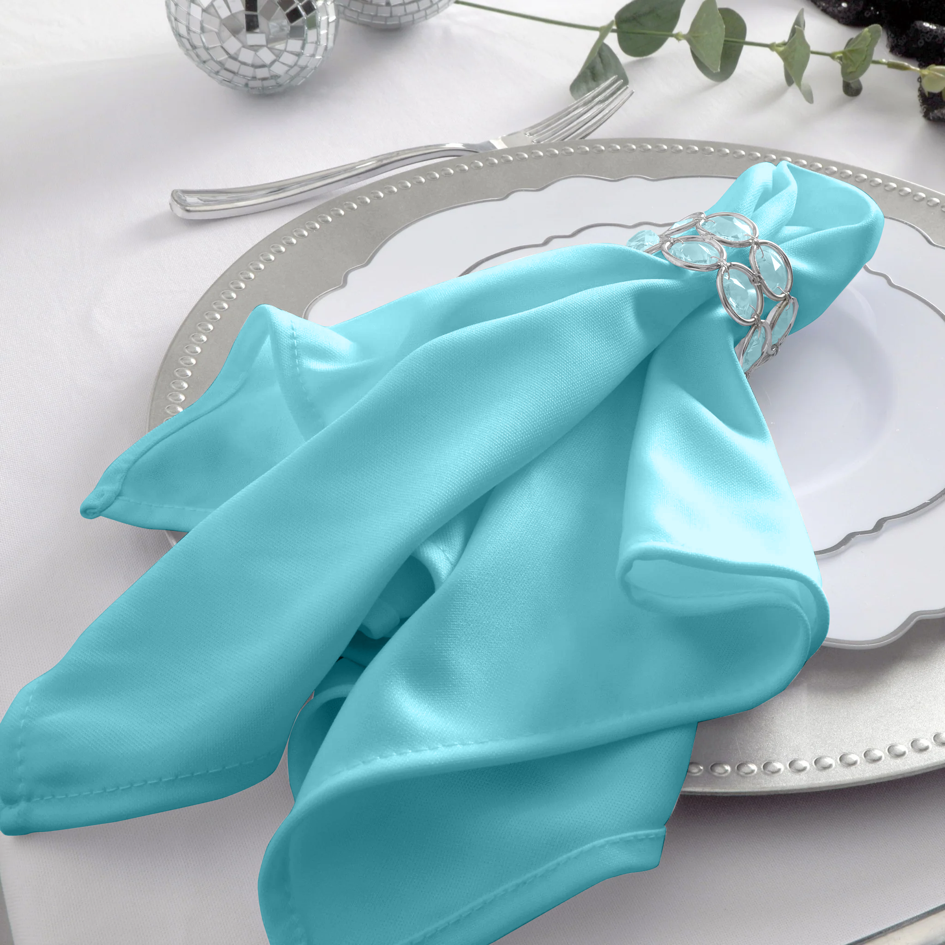Scuba Napkin 20"x20" (5 pcs/pk) Turquoise close up with crystal napkin ring