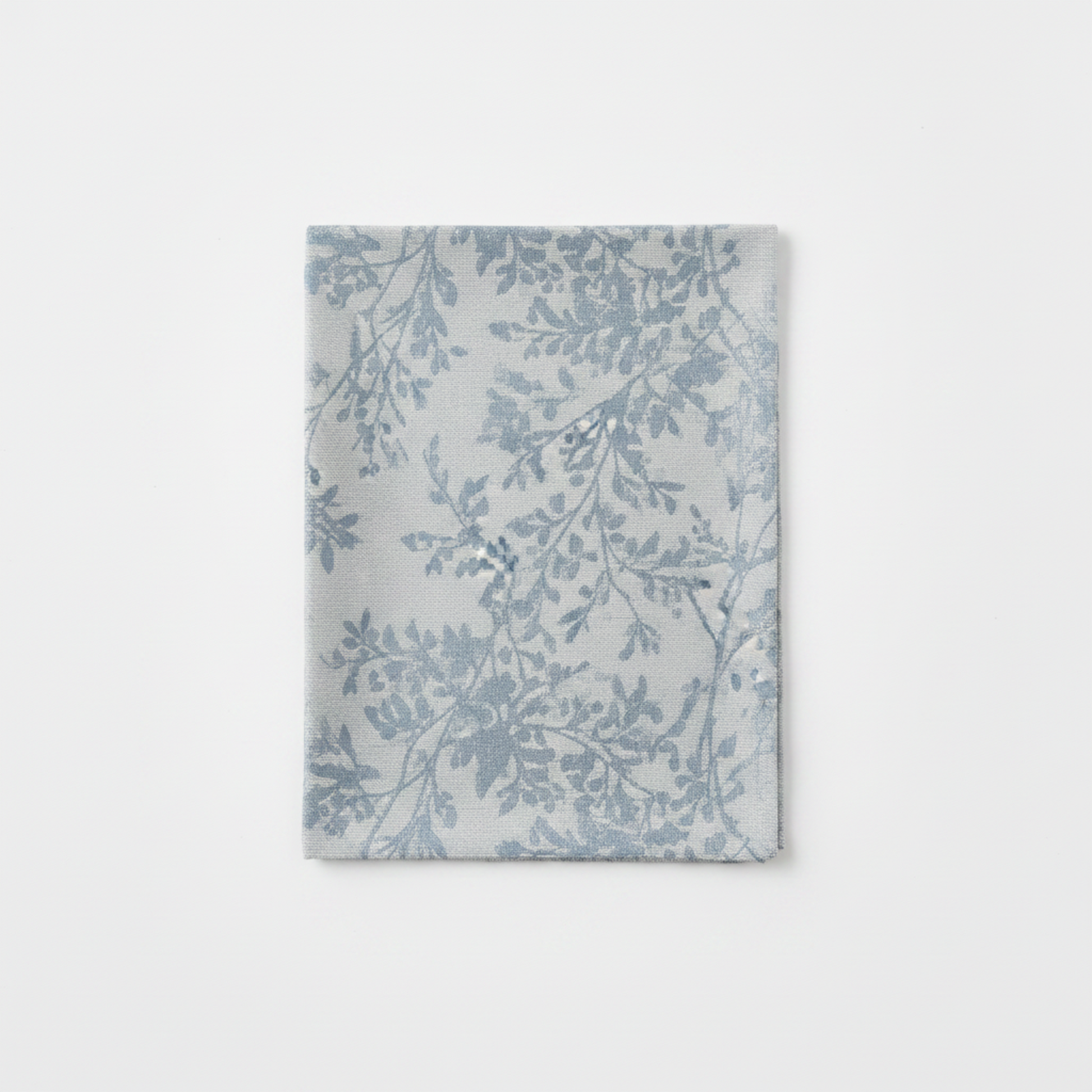 Single Dusty Blue Leaf Branch Jacquard Napkin Flat Lay