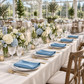 Steele Blue napkins across a conservatory banquet table