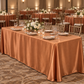 Terracotta satin tablecloth at a ballroom banquet
