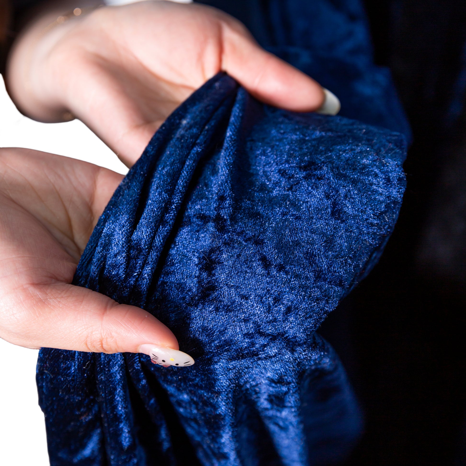 Navy velvet backdrop drape close-up view