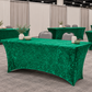 Vendor booths with matching emerald-green tables