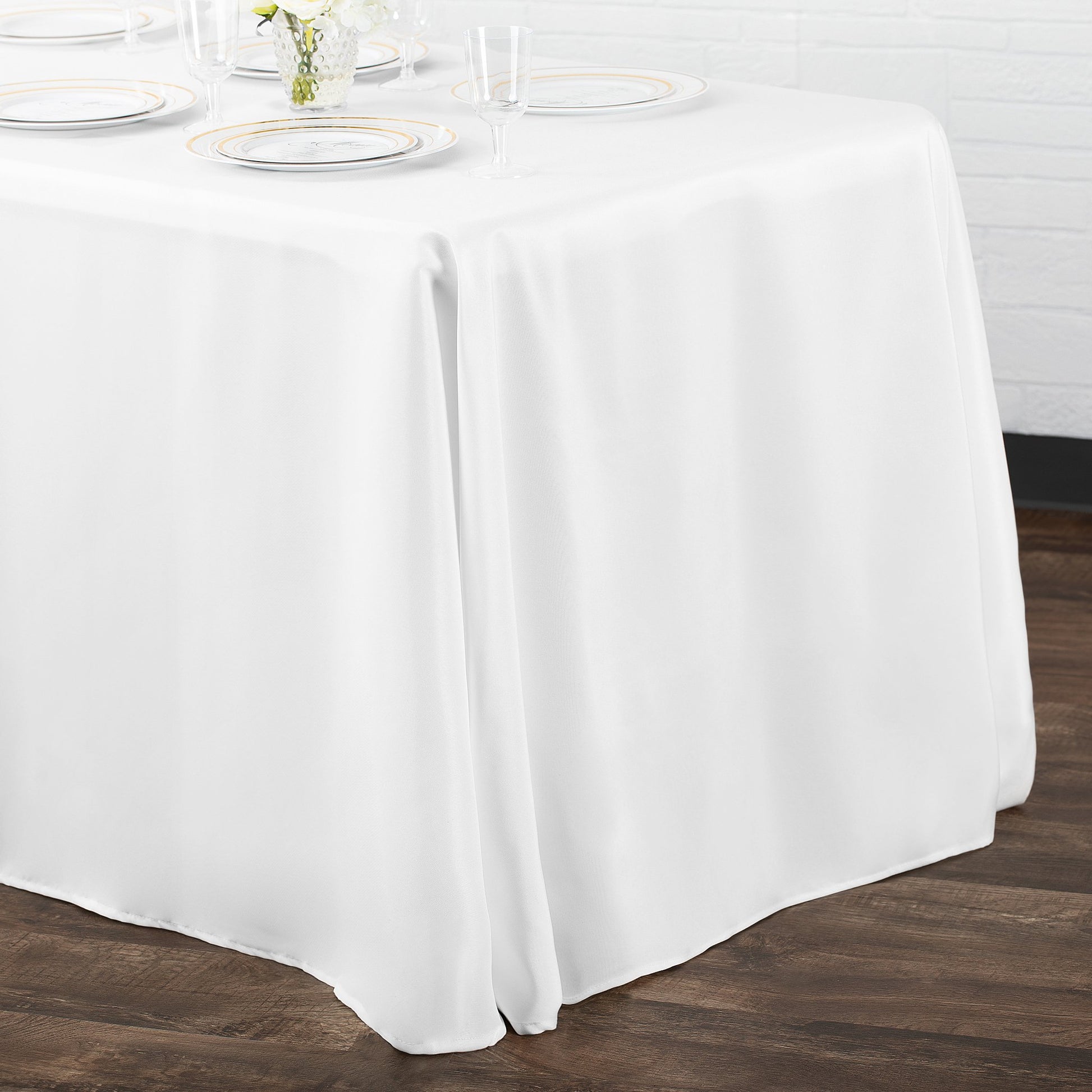 90"x132" White Rectangular Oblong Polyester Tablecloth | CV Linens